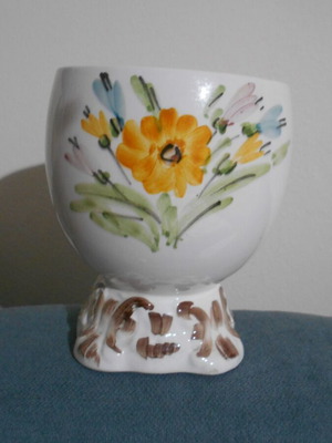 Vintage ceramic vase used in egg cup shape