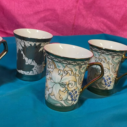 Coffee cups new, set of 4 with gold leaf and embossed designs