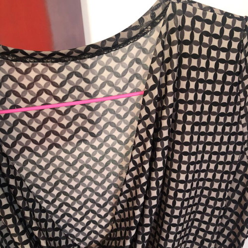 Draped dress used with geometric pattern in black and gray