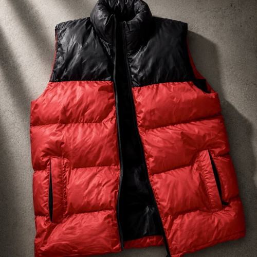 The North Face red and black puffer vest used, size M