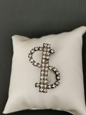 Dollar brooch like new with stones