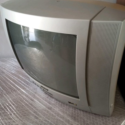 Vintage 14-inch Funai TV used, functional