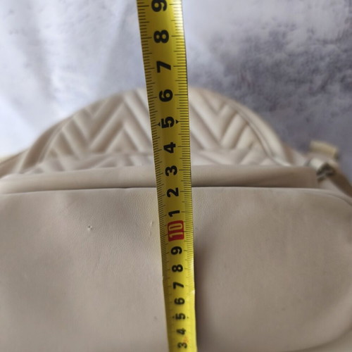 David Jones backpack used, beige with embossed design