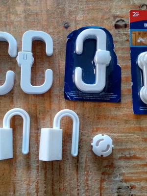 Cabinet, door and socket safety hooks in excellent condition