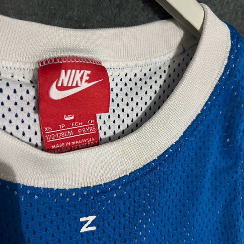 Nike set with almost new shirt and used shorts, white and blue, ages 6-8