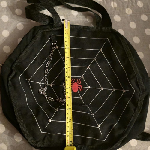 Spiderweb shoulder bag like new, black and red, 77cm strap