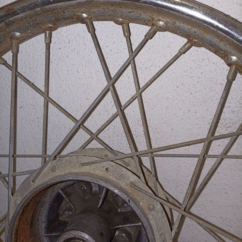 Motorcycle rim used, old with surface rust and missing spoke