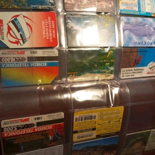 Phone card album like new, 75 cards from various countries and Greece