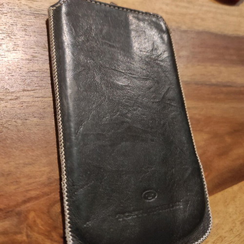 Tom Taylor leather phone case used