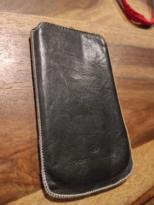 Tom Taylor leather phone case used