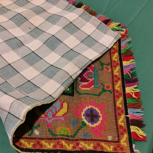 Knitted rug used with fringes lined from 1930 era
