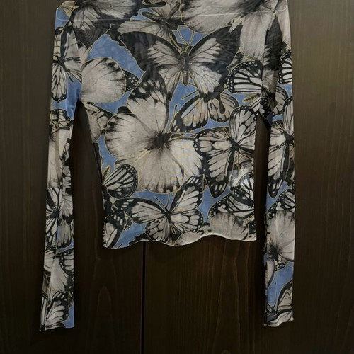 Milkwhite mesh top like new with butterfly print