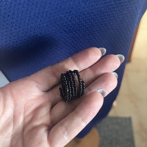 Ring spiral with black beads like new