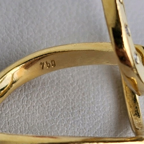 Gold 18K ring used with 7 small diamonds size 54