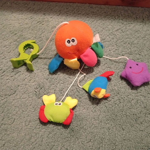 Hanging octopus baby toy used with mirror and sound animals