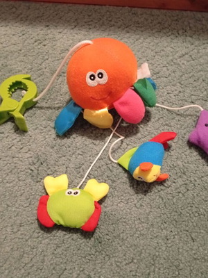 Hanging octopus baby toy used with mirror and sound animals