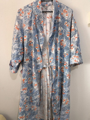 Women's Russian coat used, size XL-XXL, with tear near pocket