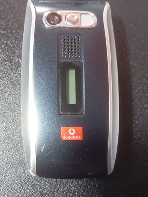 Sharp GX25 used clamshell mobile phone