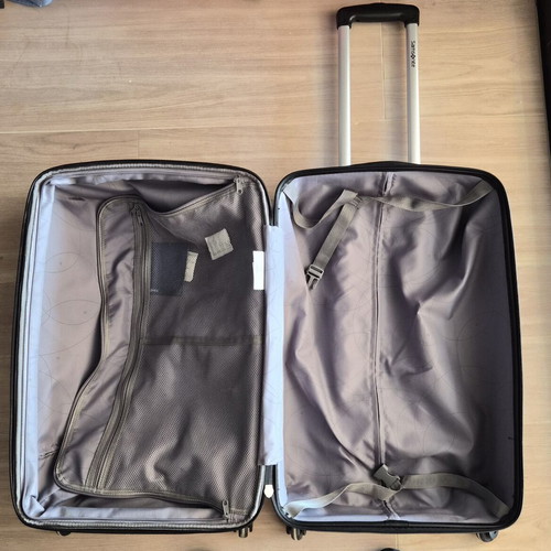 Samsonite hard suitcase used with TSA lock and 4 wheels