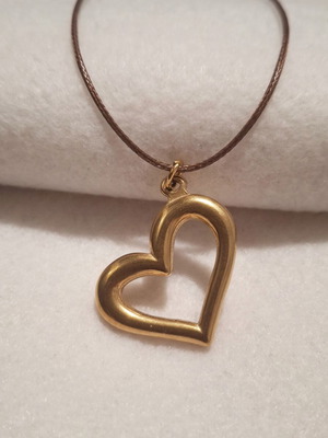 Long necklace new with steel heart and brown cord