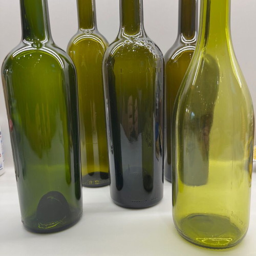 Wine Bottles like new, pack of 540 with embossed grape cluster design
