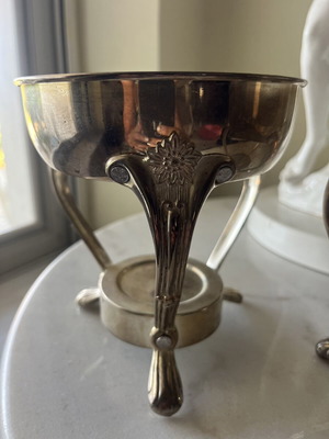 Vintage metal food warmer set with decorative legs and handles