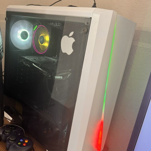 Gaming computer with Samsung Odyssey 30 inch monitor, Razer Kaira headset, Logitech controller