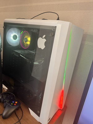 Gaming computer with Samsung Odyssey 30 inch monitor, Razer Kaira headset, Logitech controller