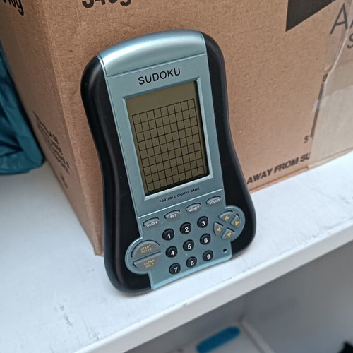 Sudoku handheld electronic game