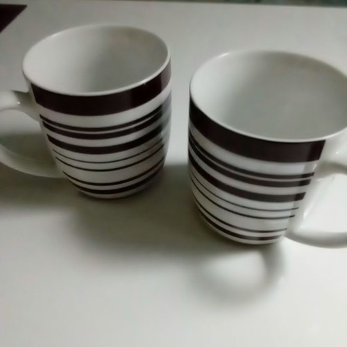 Set of white mugs with stripes like new