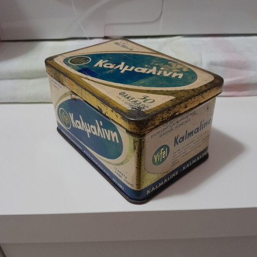Metal antique box used from kalmaline with buttons