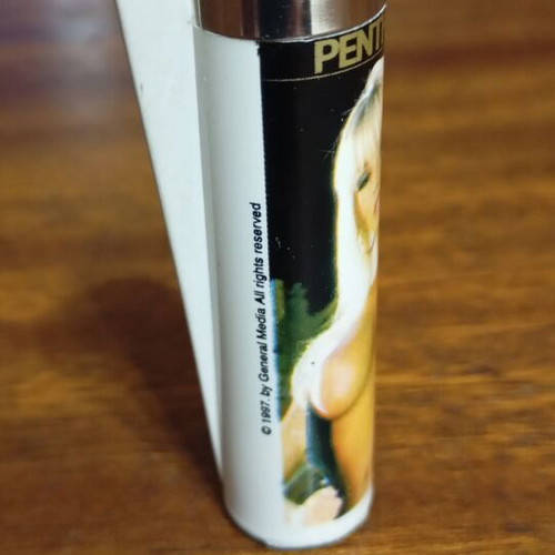Clipper lighter like new with Penthouse logo and vintage design
