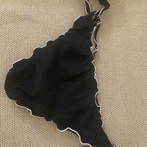 M&D black swimsuit used, fits small and medium sizes
