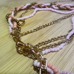 Long pink necklace with mixed chains