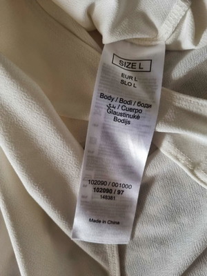 White bodysuit new, size Large