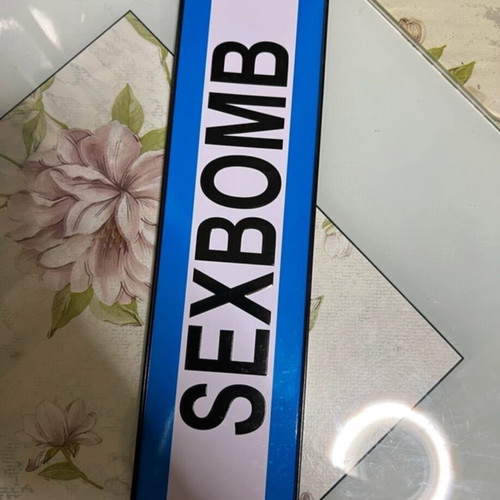 Sexbomb metal plate like new 7x26 with 2 slots