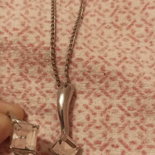 Pendant and ring set like new, rustproof metal