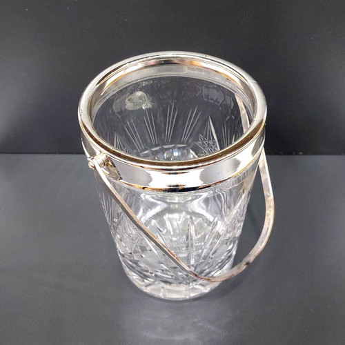 Glass ice bucket used with metal handle