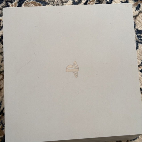 PlayStation 4 Pro Destiny Edition console with two controllers