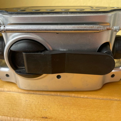 Power Plus solar transistor radio used with clock and flashlight