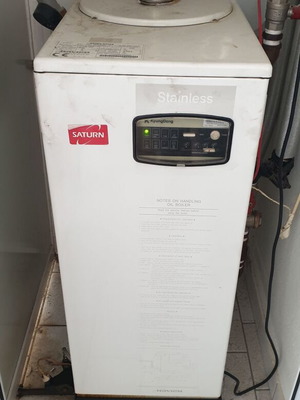 Saturn oil burner with 500 litre oil tank and metal enclosure