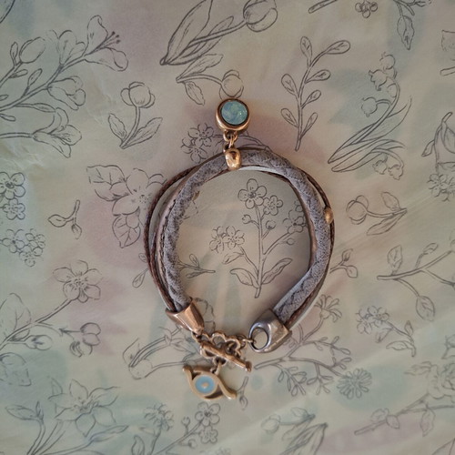Boho multi-strand bracelet with crystal and evil eye charm