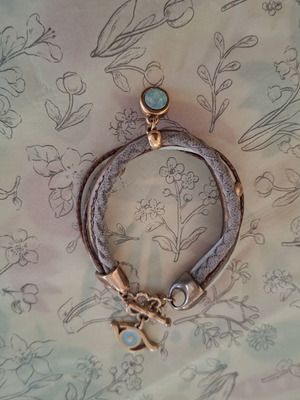 Boho multi-strand bracelet with crystal and evil eye charm