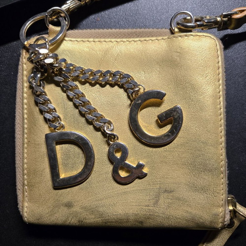 Dolce & Gabbana πορτοφόλι μεταχειρισμένο χρυσαφί με φερμουάρ και λογότυπο