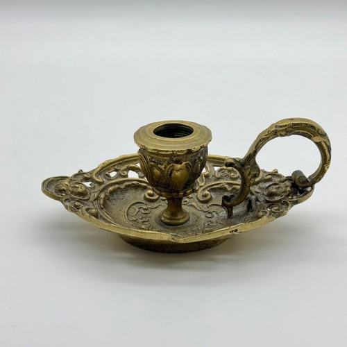 Brass carved candlestick with handle