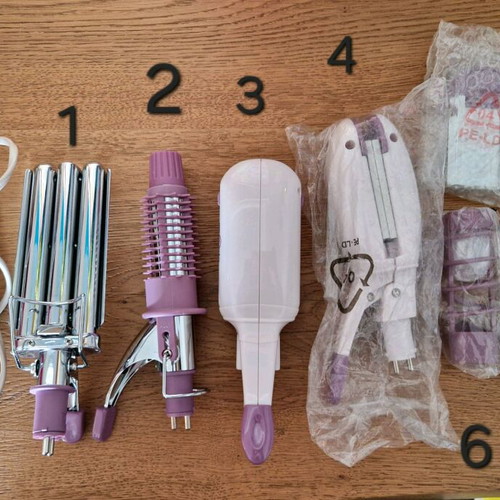 Hair Majesty hair straightener like new with 7 attachments and carrying pouch