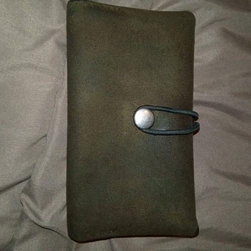Smoking case used with compartments for filters, rolling papers, and lighter