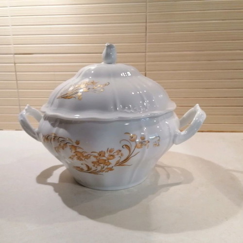 Porcelain soup tureen used with gold floral details