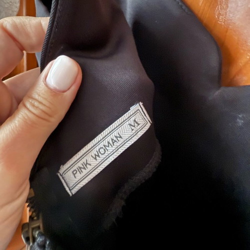 Pink Woman dress black like new, tight with nice chest cut