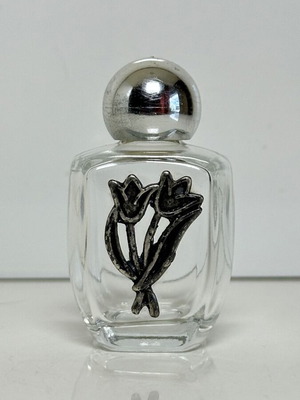 Vintage glass perfume bottle with metal tulip decoration